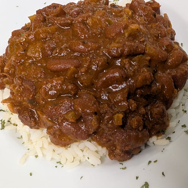 Chili Over Rice with Crackers Hot Chili Soup.